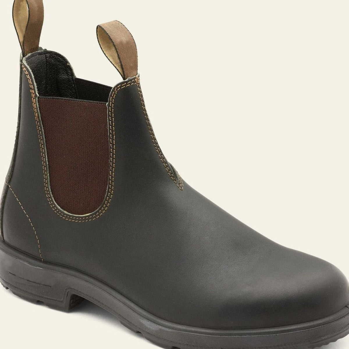 Dark brown leather Chelsea boots with contrast stitching and pull-tab detail