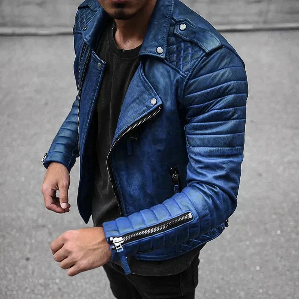 Blue distressed faux leather biker jacket featuring quilted shoulders and zip detailing