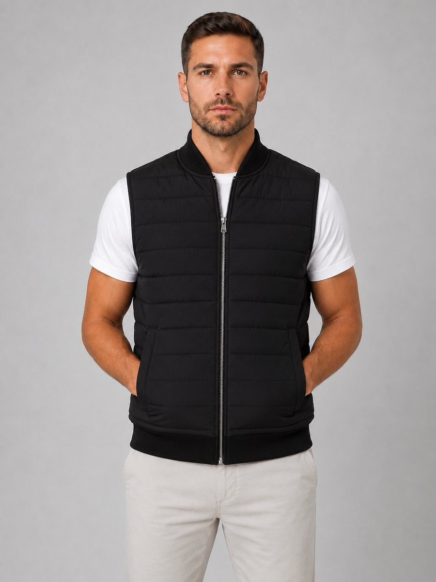 Black quilted gilet with knitted collar and zip fastening, front view