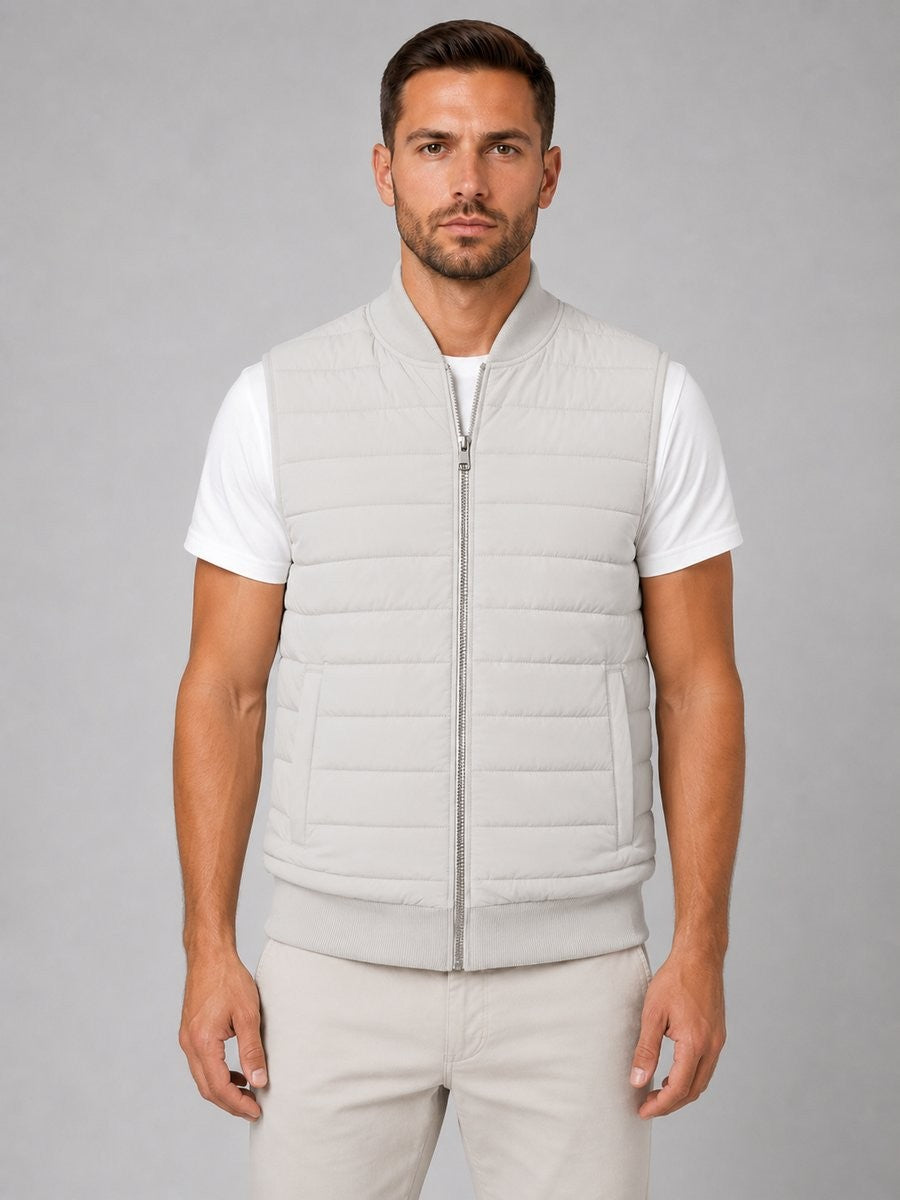 Stone grey quilted bodywarmer with knitted collar and side pockets