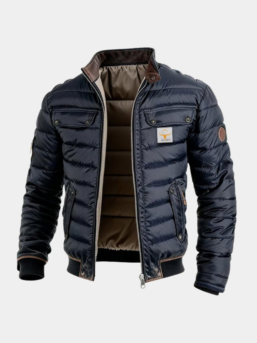Men's navy quilted bomber jacket with high collar and chest pockets