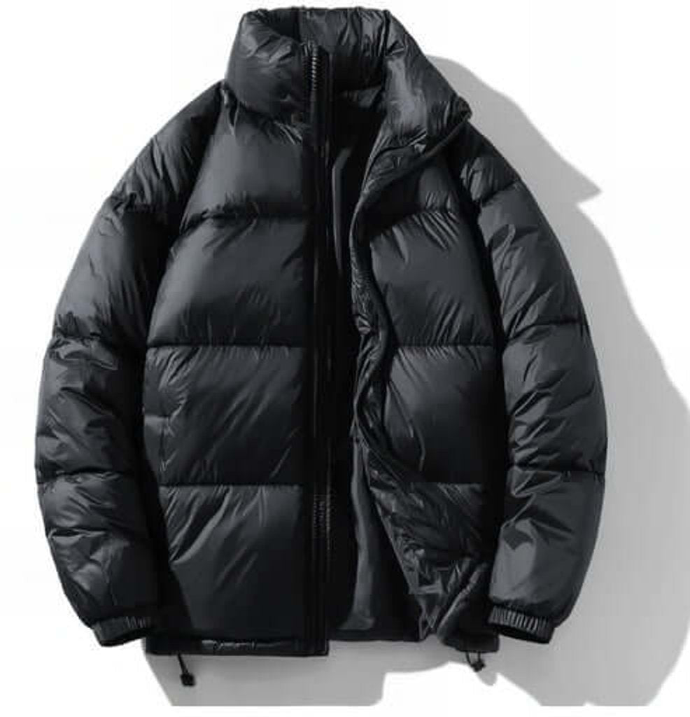 Black quilted puffer bomber jacket with high funnel neck and zip fastening