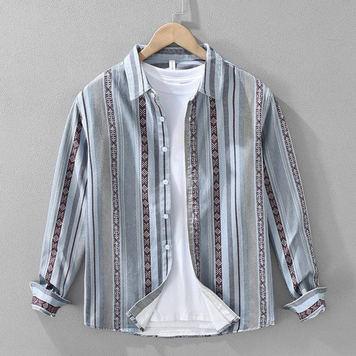 Pale blue striped cotton flannel shirt with tribal trim, buttoned long-sleeve design
