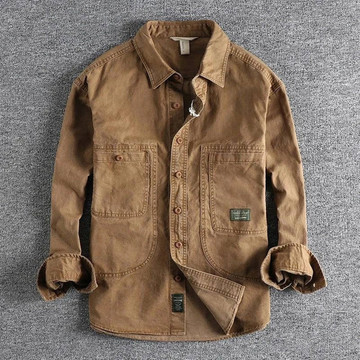 Khaki cotton utility overshirt with twin chest pockets and button front