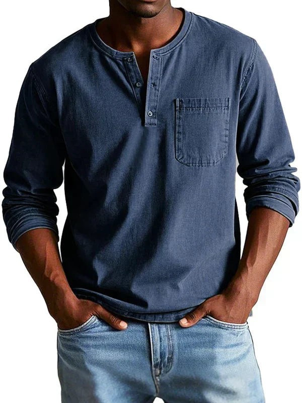 Slate blue long sleeve Henley shirt featuring button placket and chest pocket