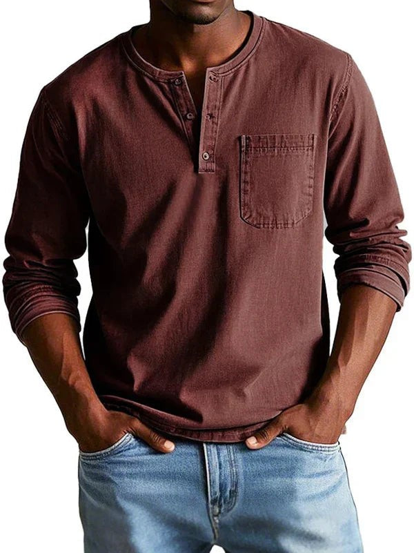 Maroon long sleeve Henley shirt with round neckline and stitched chest pocket