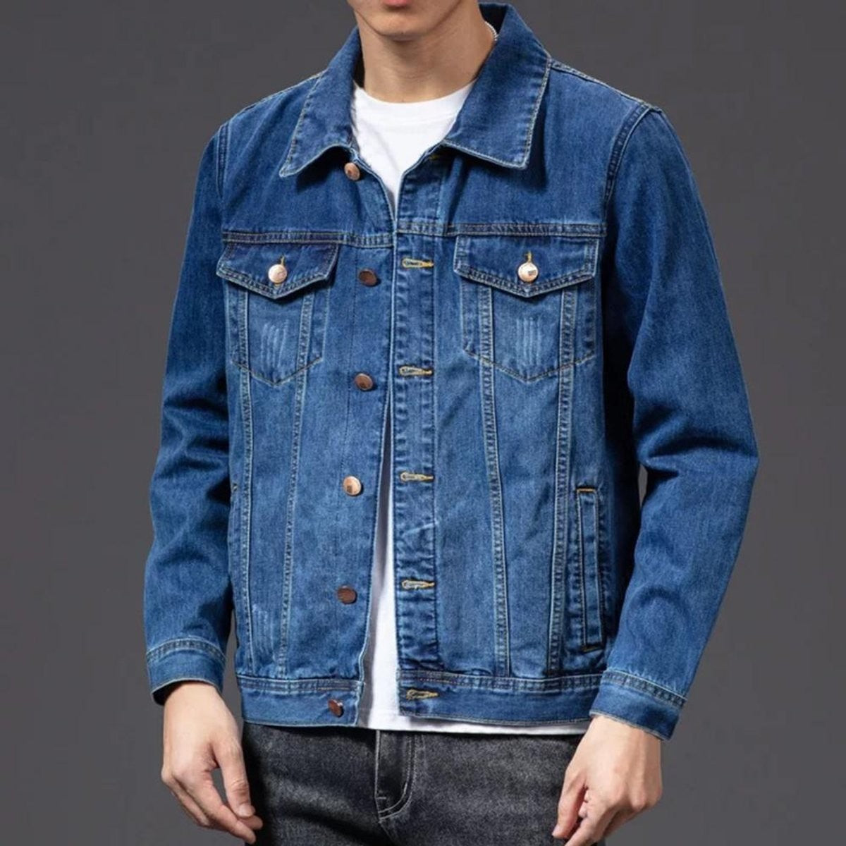 Classic denim jacket in mid-wash blue with twin flap chest pockets