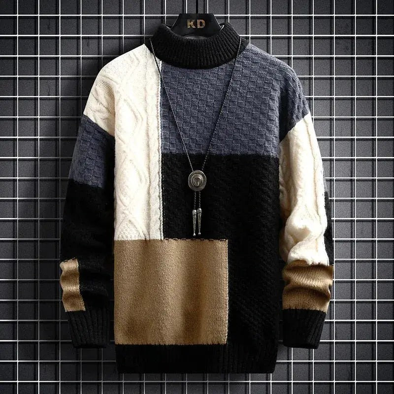Cable knit mock neck jumper in navy, black and camel patchwork pattern