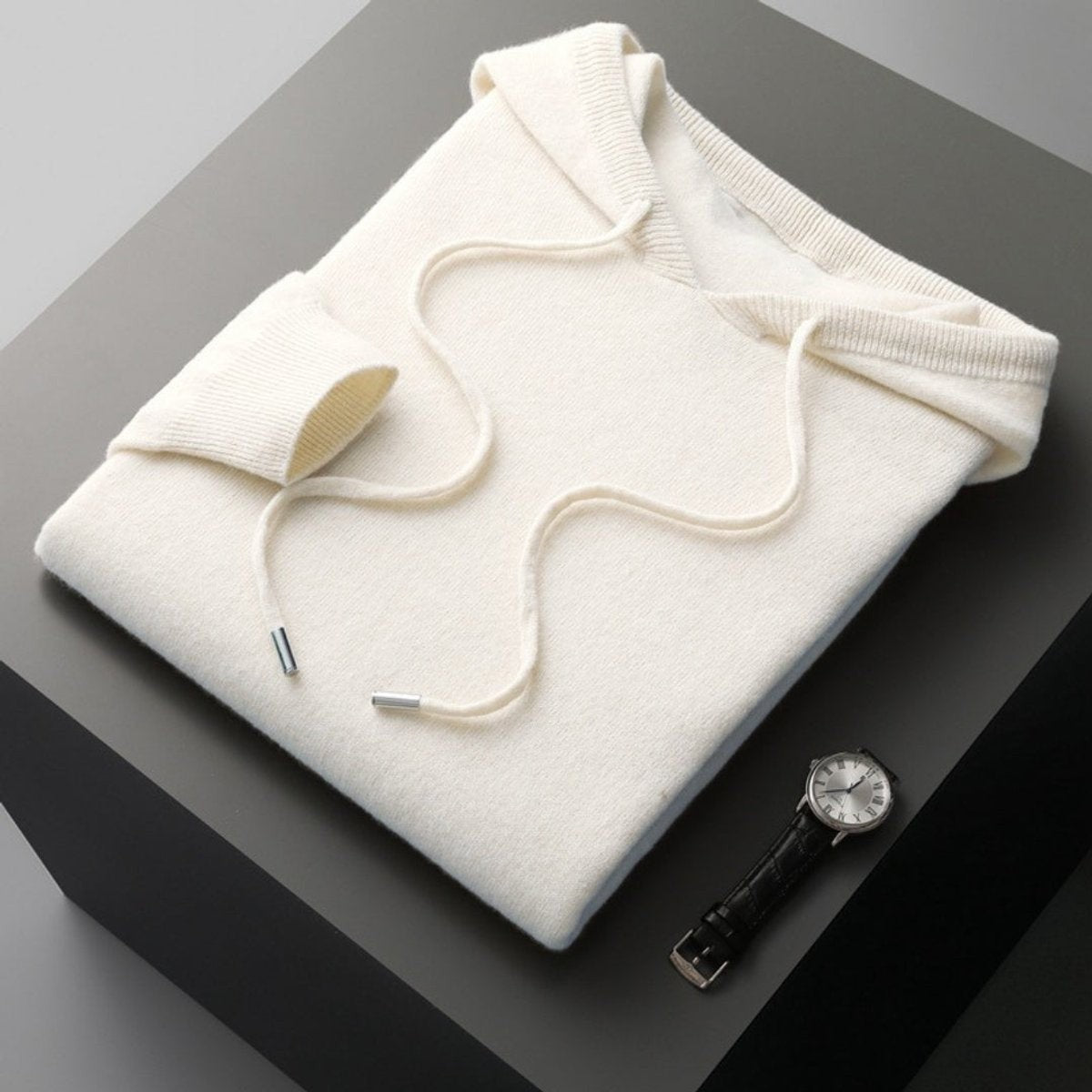 Folded ivory cashmere hoodie jumper with ribbed trim and drawstring detail