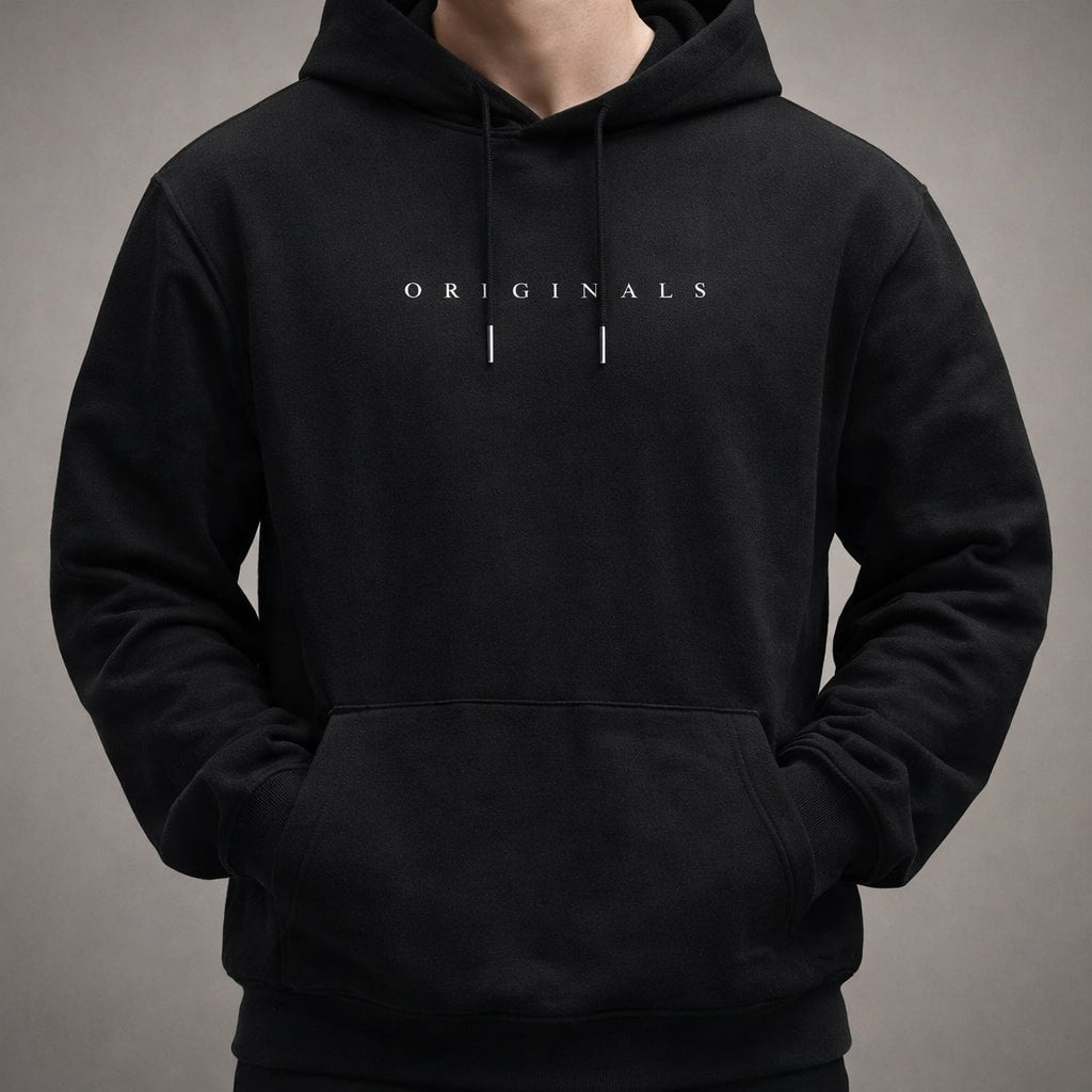 Man wearing black relaxed hoodie with drawstring hood and logo print