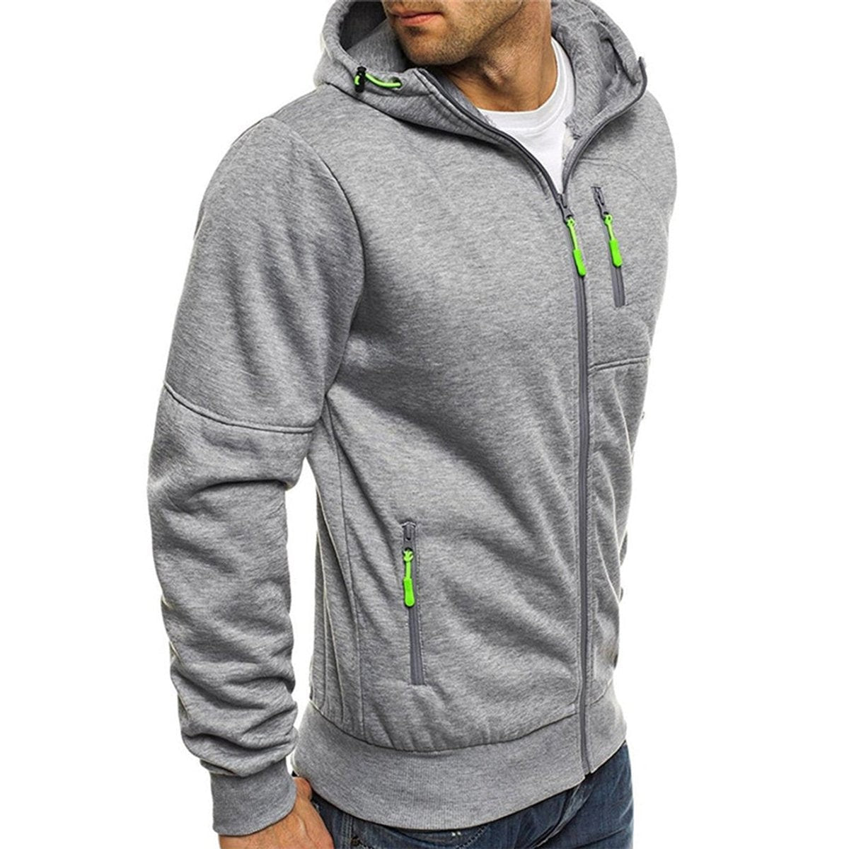 Side angle of grey zip-up hoodie with contrast green zip pullers