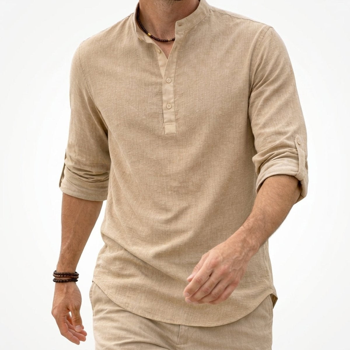 Beige linen henley shirt with grandad collar, matched with linen trousers