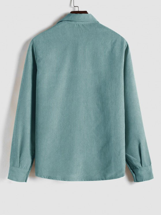 Back view of sage green corduroy shirt on hanger