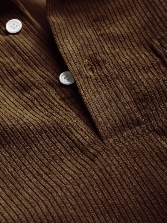 Close-up of olive brown corduroy collar and placket stitching