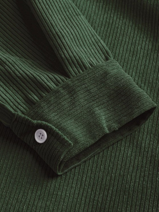 Close-up of forest green corduroy sleeve cuff detail