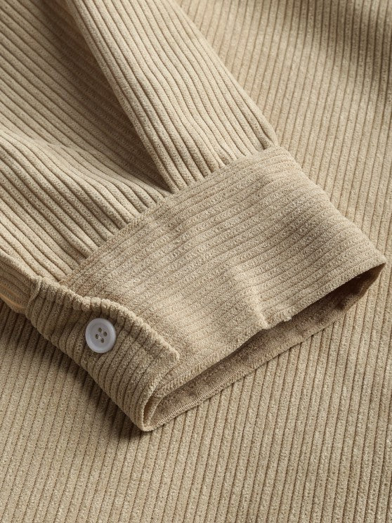 Close-up of beige corduroy cuff with ribbed texture
