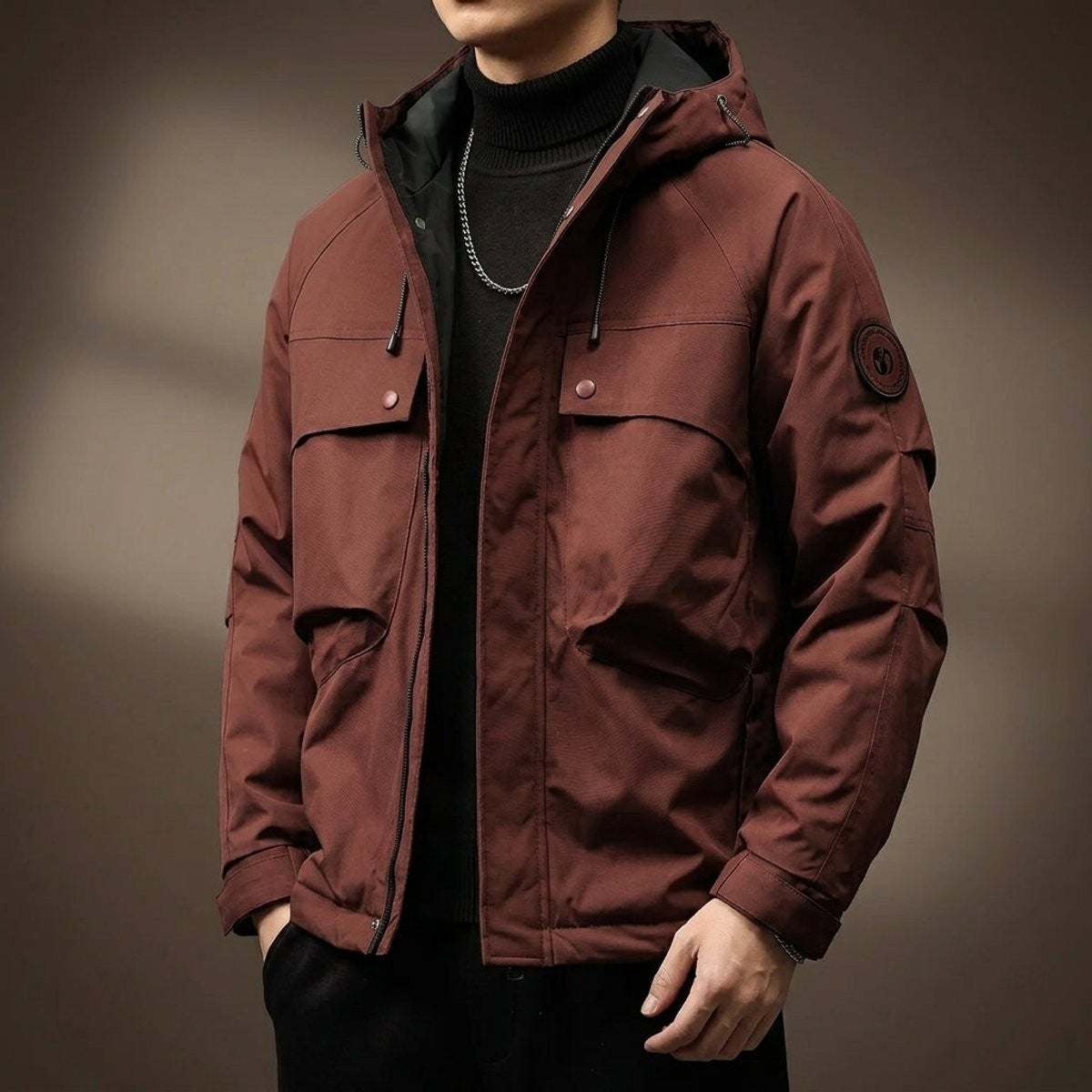 Burgundy hooded utility jacket with dual chest pockets and zip front