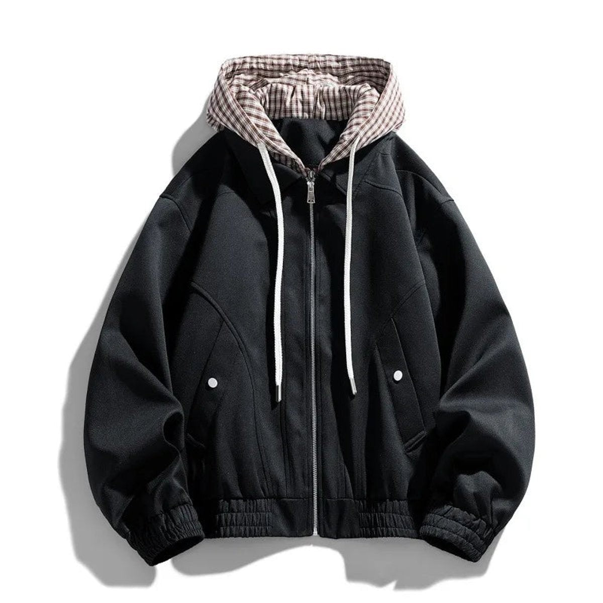 Black zip-up bomber jacket featuring contrast plaid hood lining