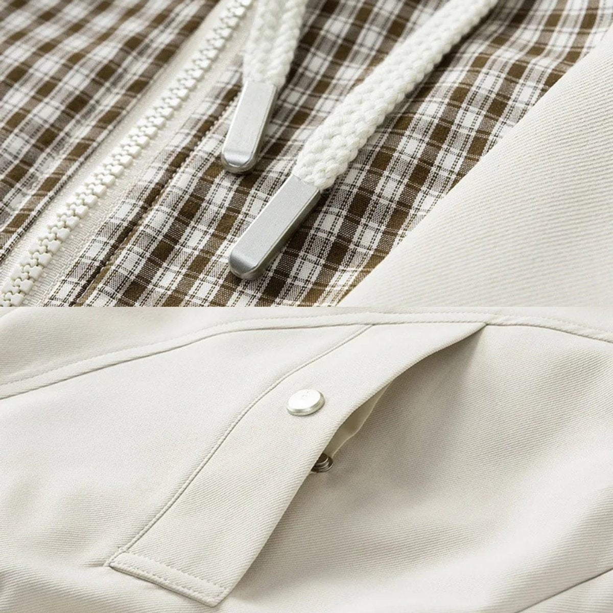 Close-up of drawstring toggles and popper fastening on cream jacket