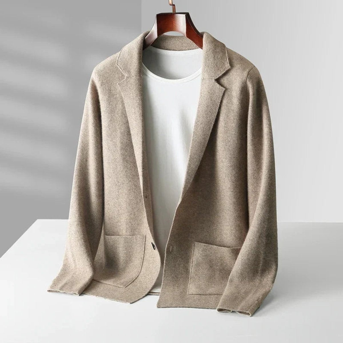 Beige cashmere knitted blazer cardigan with notch lapel and patch pockets