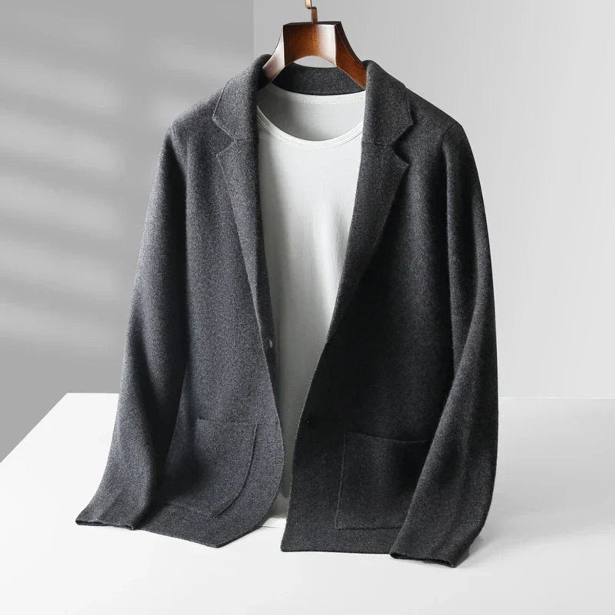 Charcoal grey knitted blazer cardigan with notch lapel and front pockets
