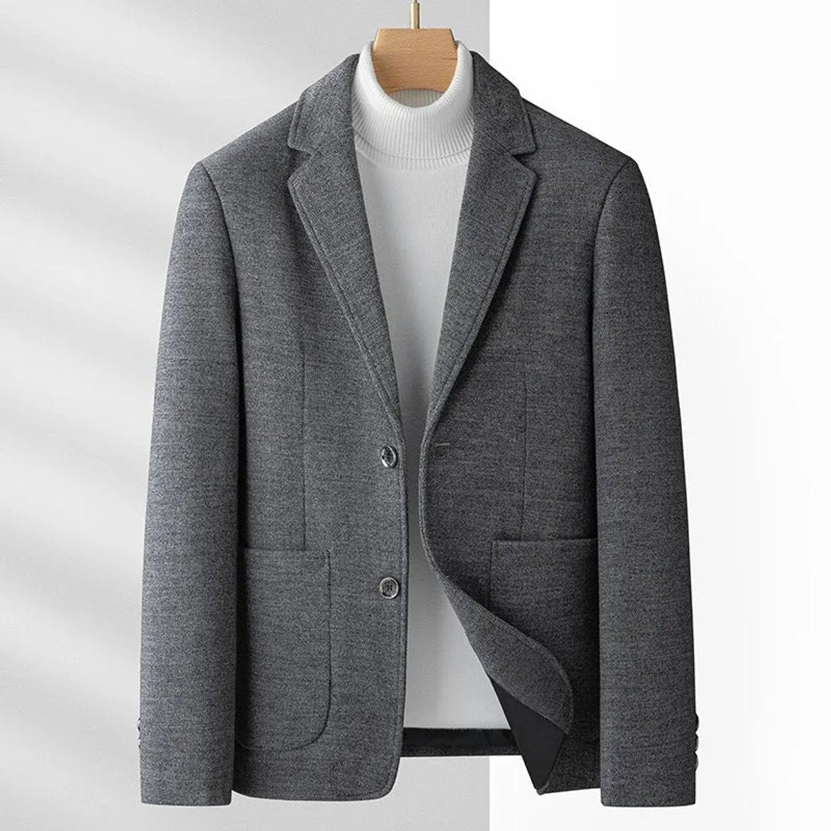 Charcoal grey blazer jacket with two-button fastening and patch pockets