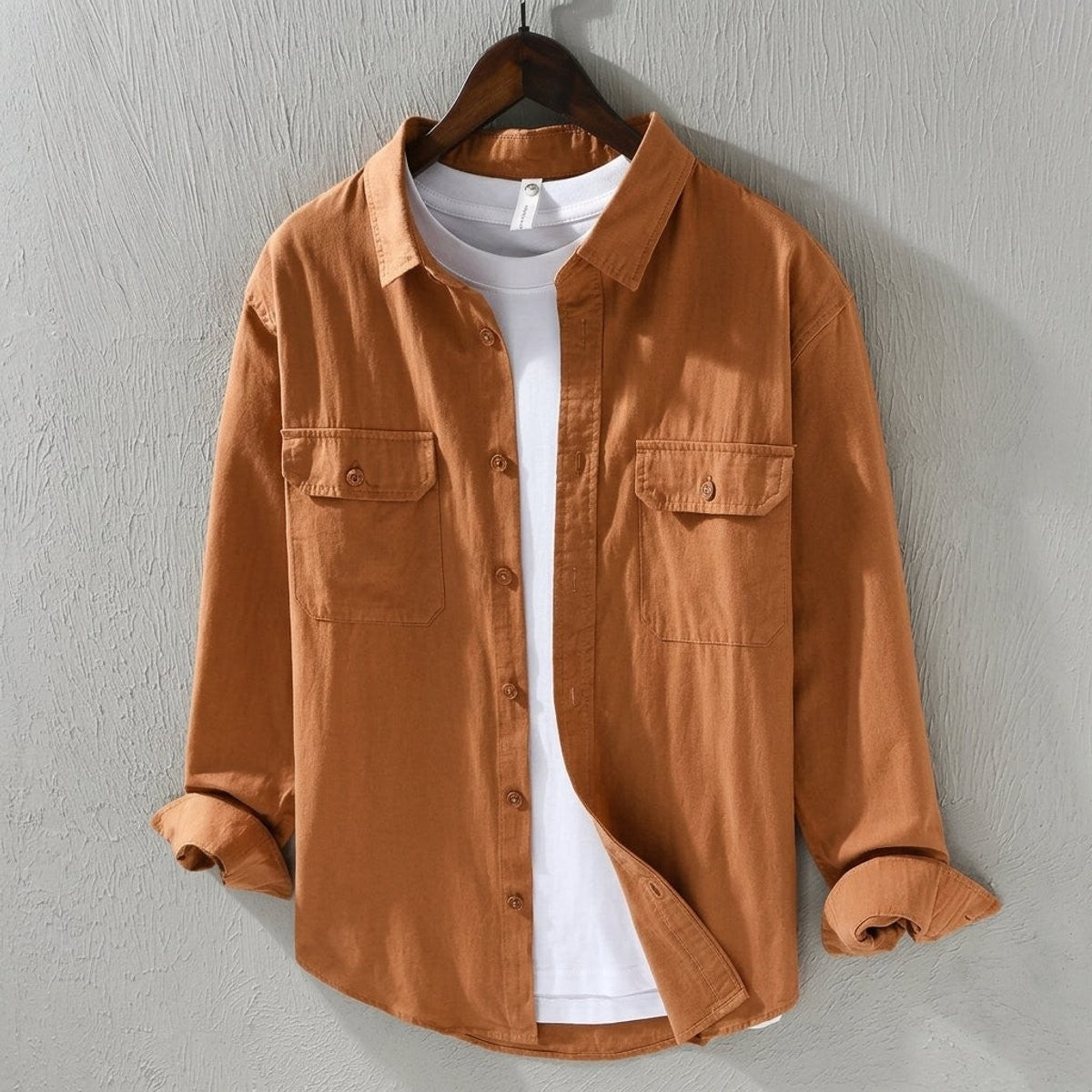 Rust orange flannel shirt jacket showing button front and chest pockets