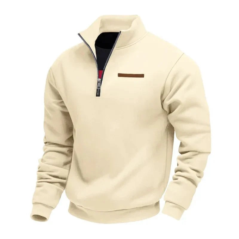 Cream quarter-zip sweatshirt with stand-up collar and brown accent