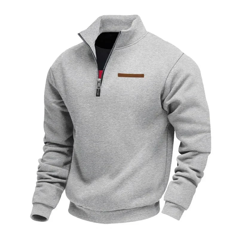 Grey marl half-zip pullover with high neck and tan chest strip
