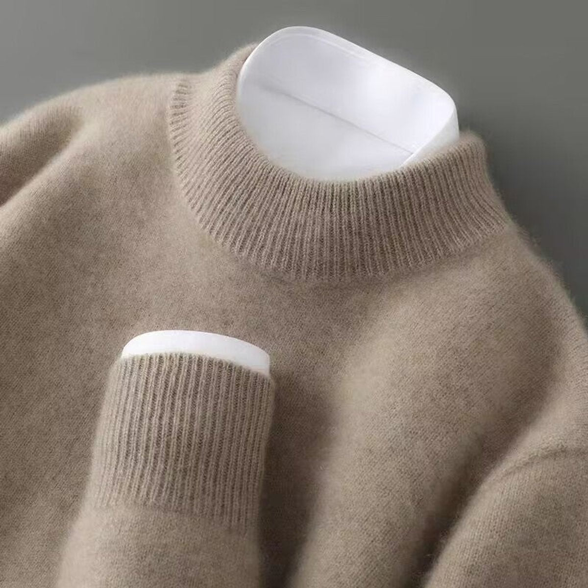 Beige cashmere crew-neck jumper showing soft ribbed knit trim