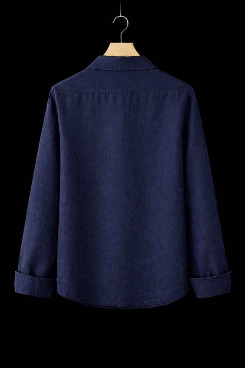 Navy linen shirt rear view showing plain back panel and rolled cuffs