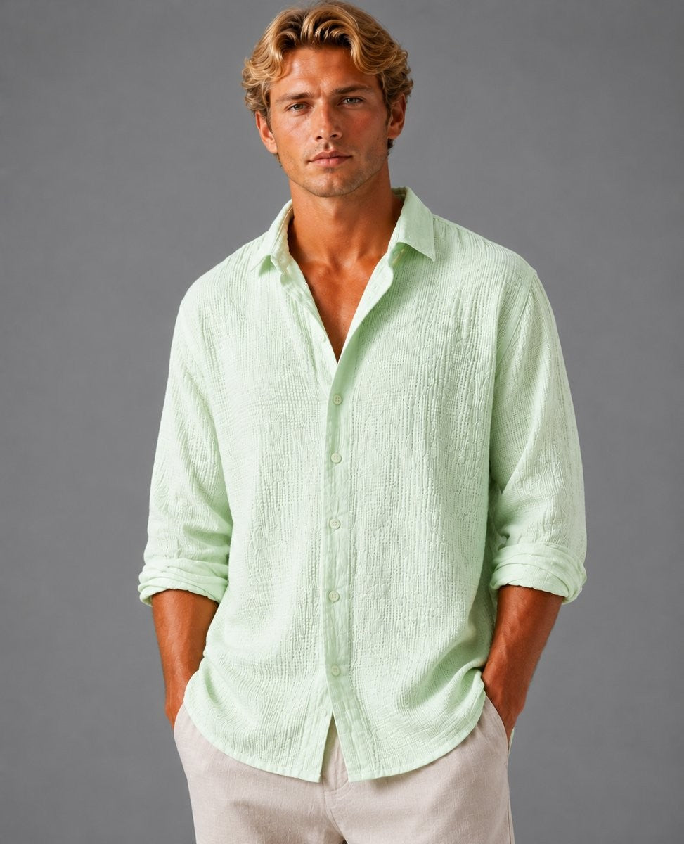 Mint green crinkle-texture shirt styled with a relaxed, oversized fit