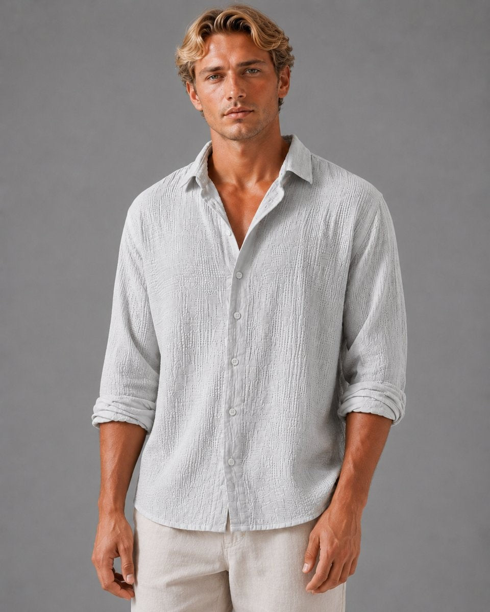 Light grey textured shirt worn casually open at the neck