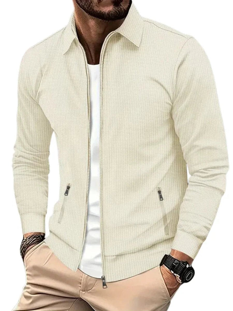 Beige waffle-knit full-zip jacket with pointed collar and zip pockets