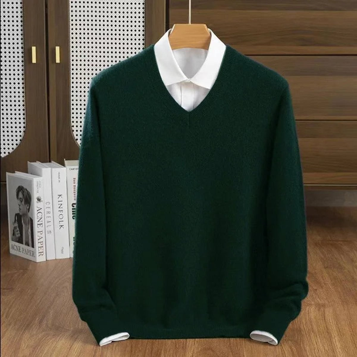 Dark green V-neck cashmere pullover styled with a white shirt collar