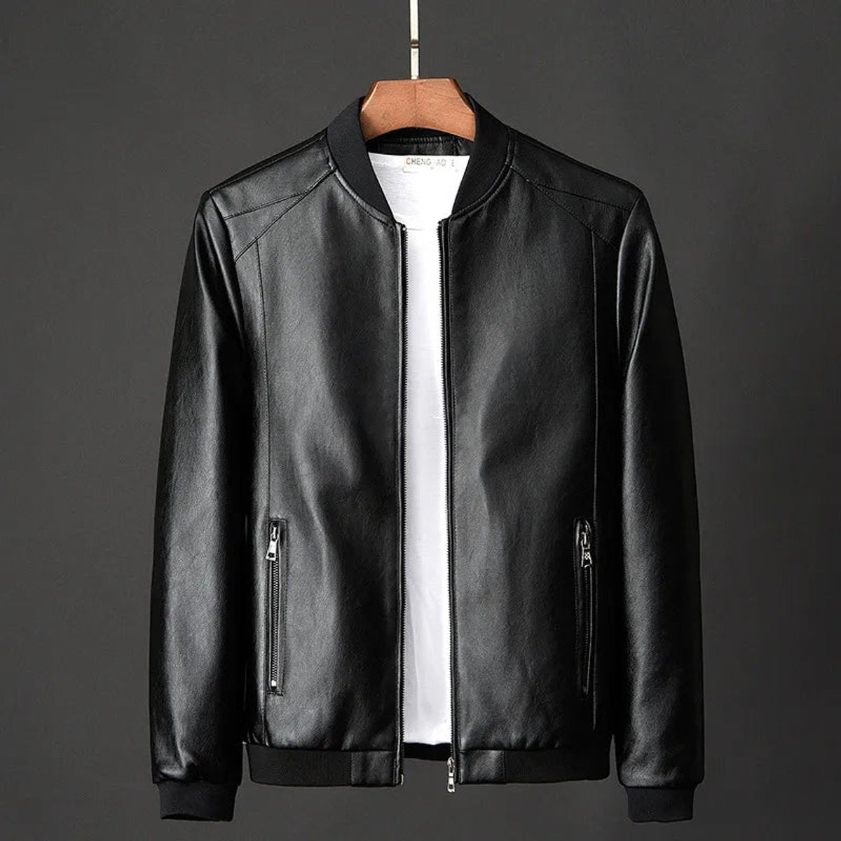 Black vintage-style bomber jacket with front zip and ribbed hem