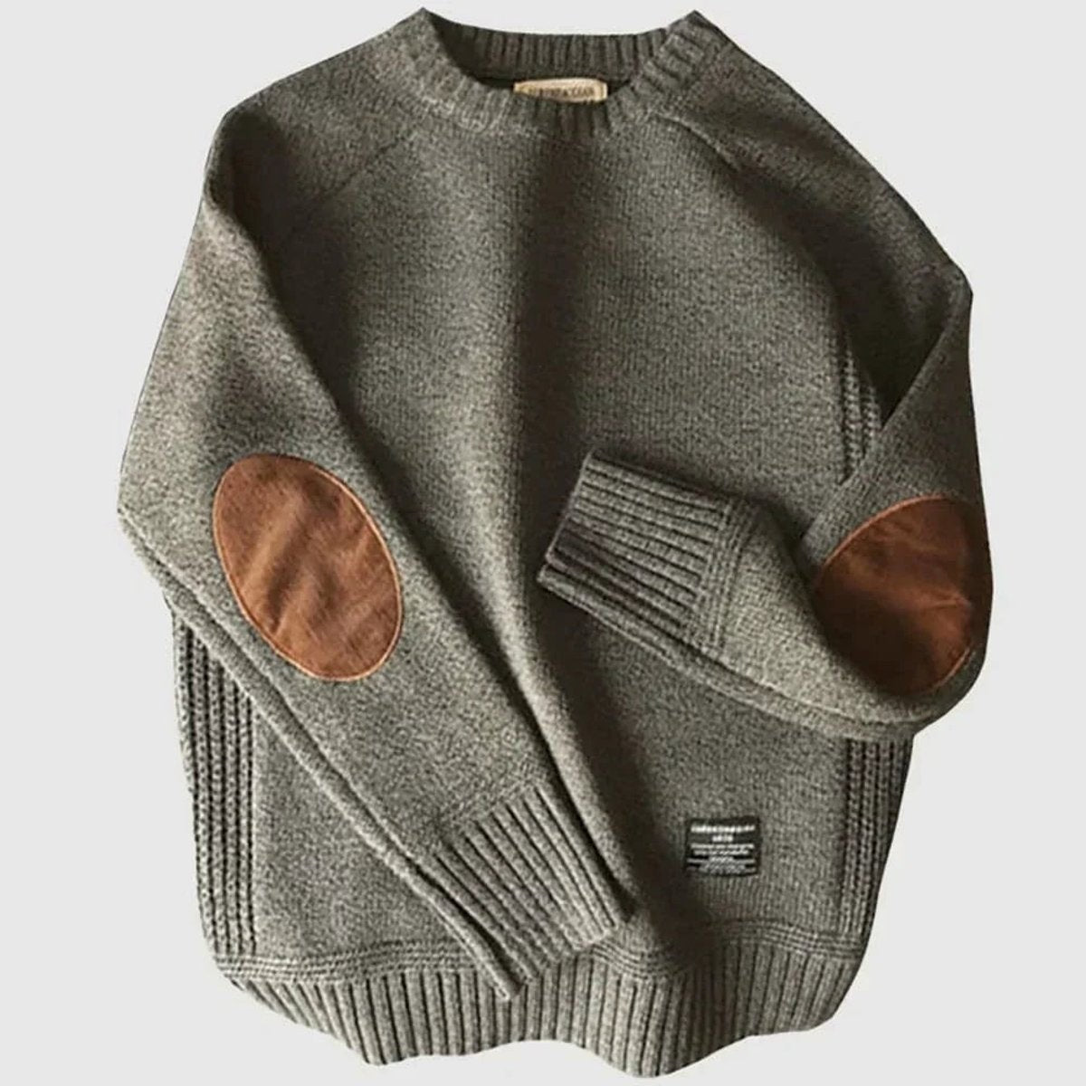 Khaki knitted crew neck jumper with tan suede elbow patches and ribbed cuffs