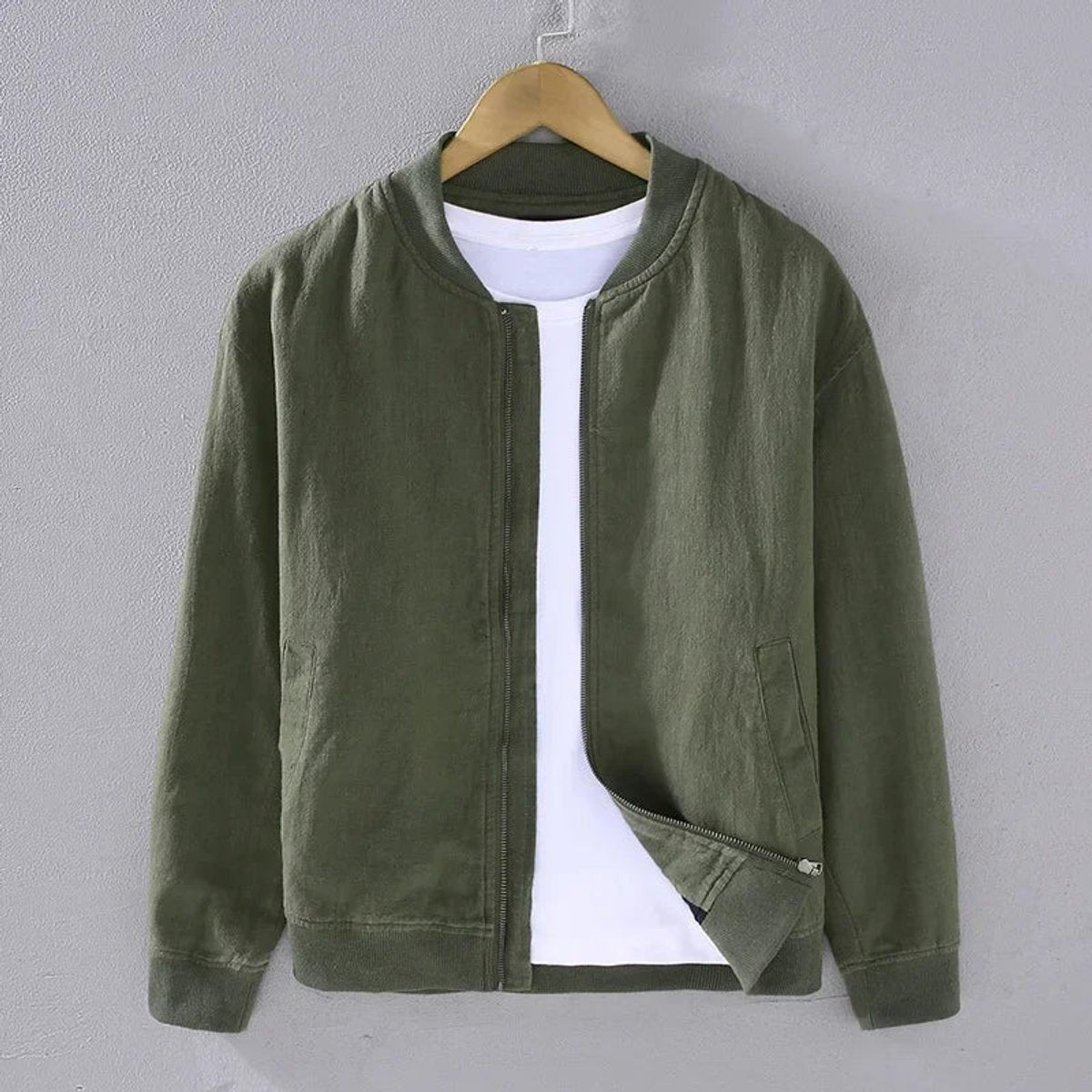 Khaki green zip-up bomber jacket with ribbed trims and pockets