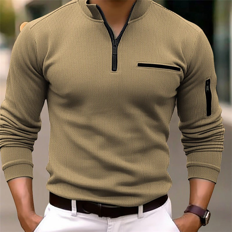 Beige quarter-zip ribbed top with stand collar and sleeve zip pocket