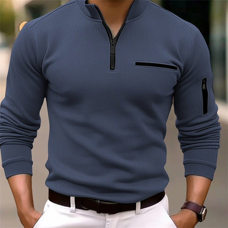 Slate blue ribbed quarter-zip top with contrast stitching and stand collar
