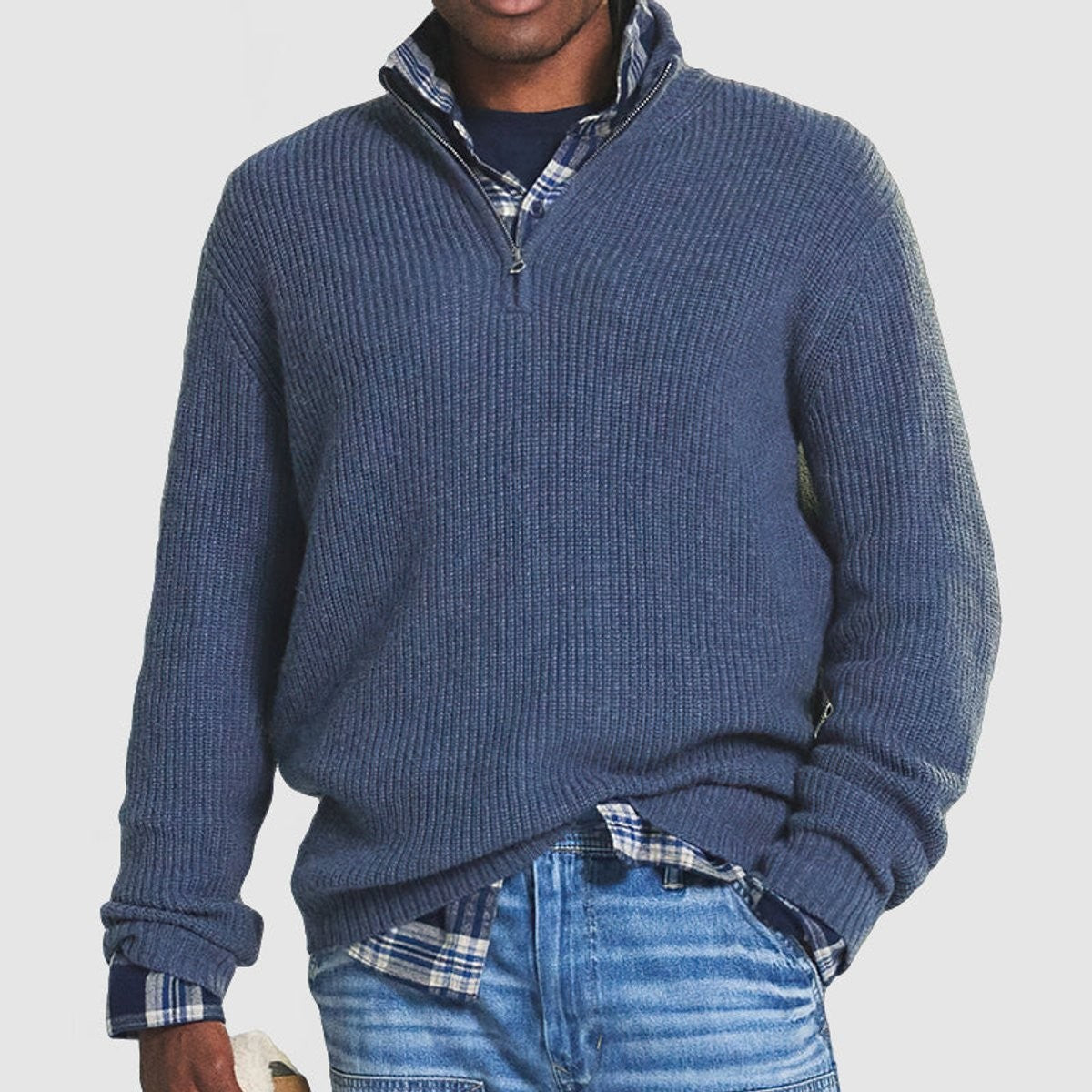 Slate blue ribbed knit quarter-zip jumper styled with denim and checked shirt