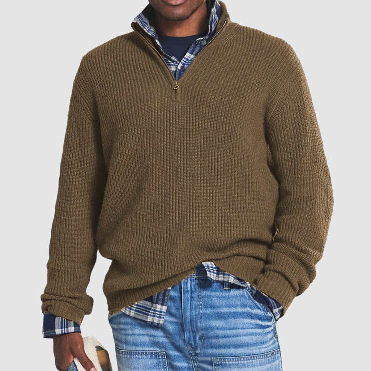 Khaki brown ribbed knit quarter-zip jumper paired with plaid shirt and jeans