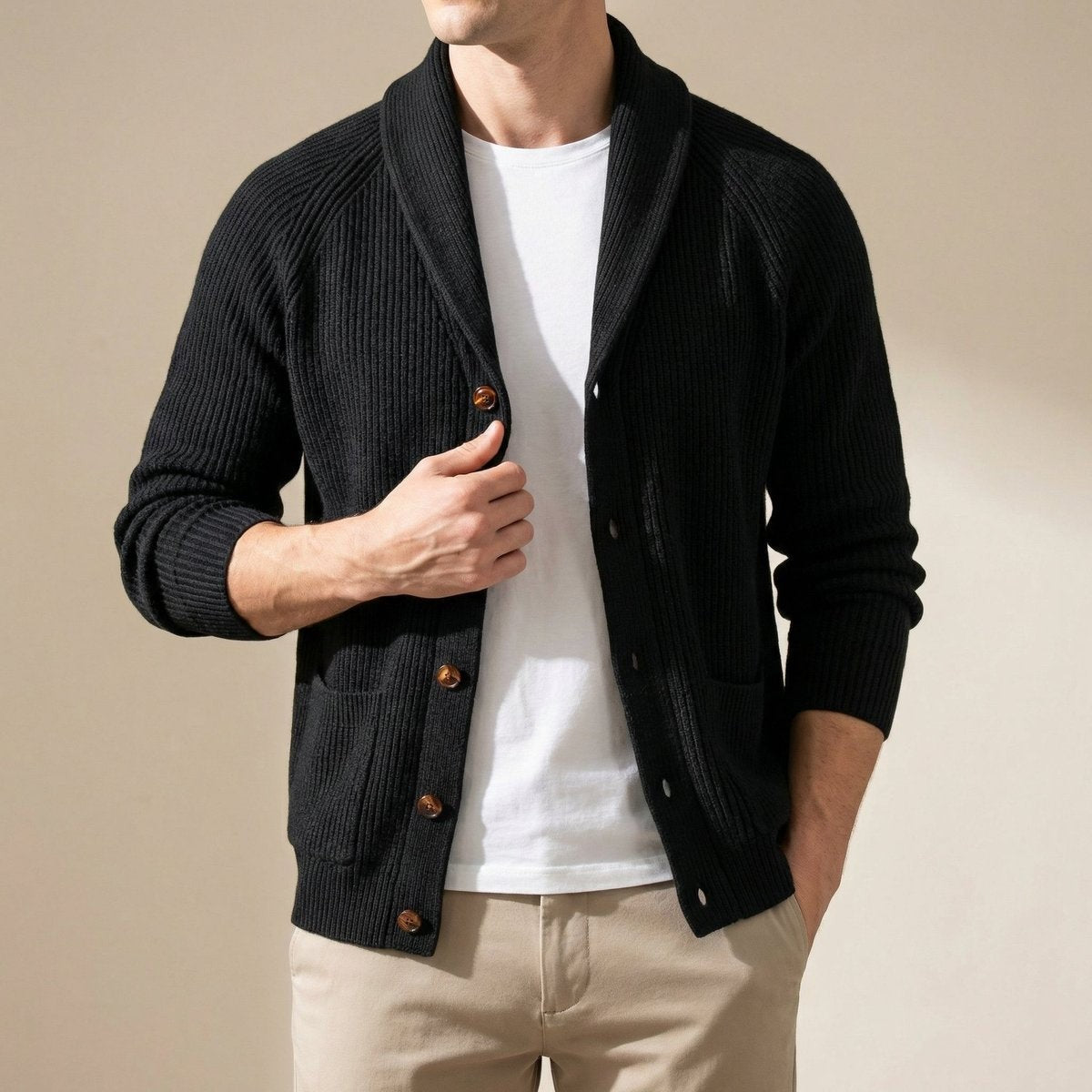 Black ribbed shawl-collar cardigan buttoned over a white t-shirt