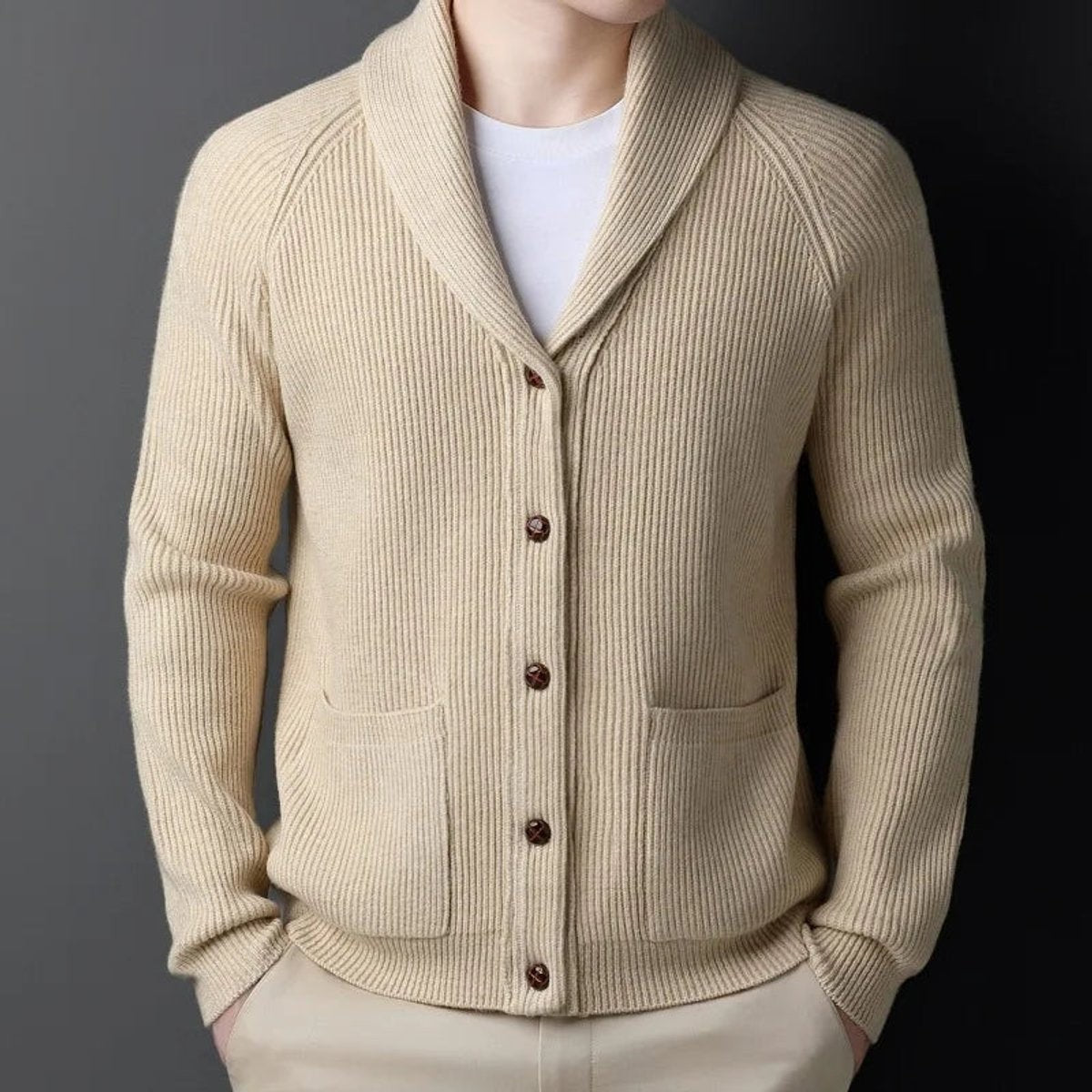 Cream ribbed wool cardigan with shawl collar and twin patch pockets