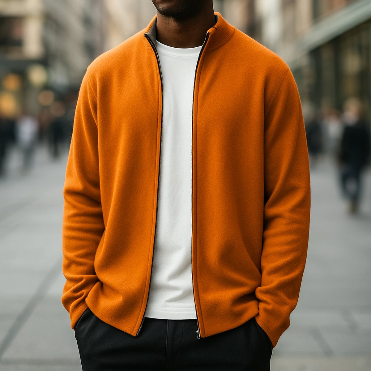 Man modelling orange cashmere zip cardigan with stand-up collar