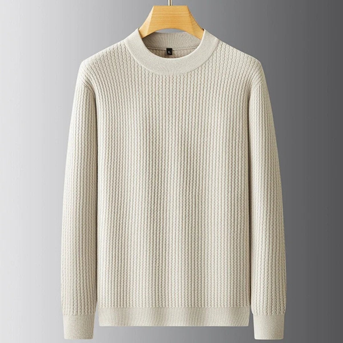Beige ribbed knit jumper with crew neck, displayed on wooden hanger