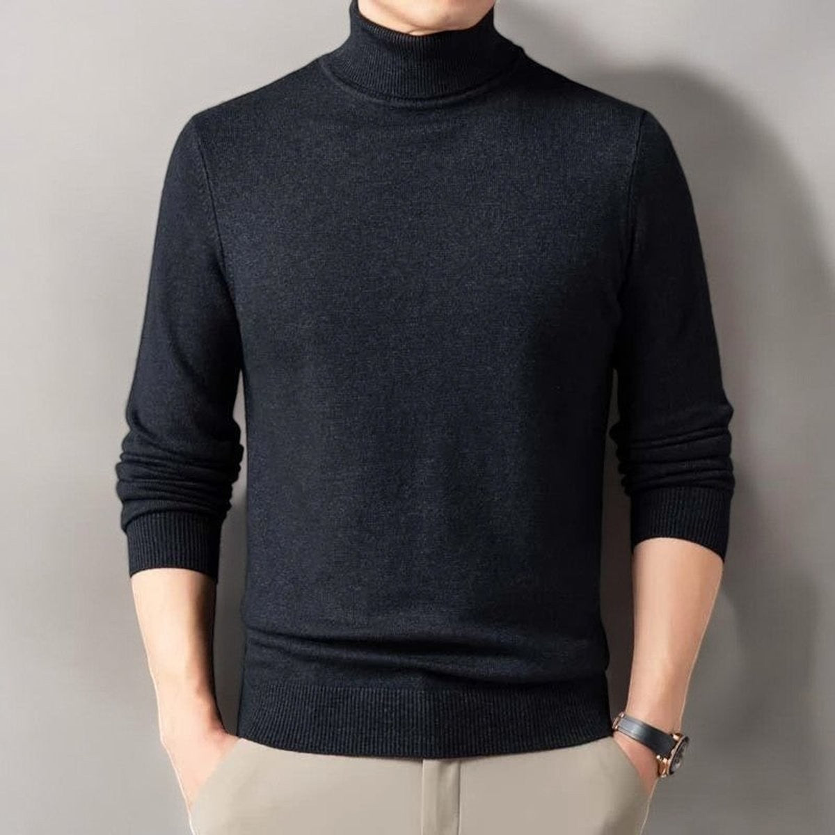 Man wearing black ribbed turtleneck jumper with long sleeves