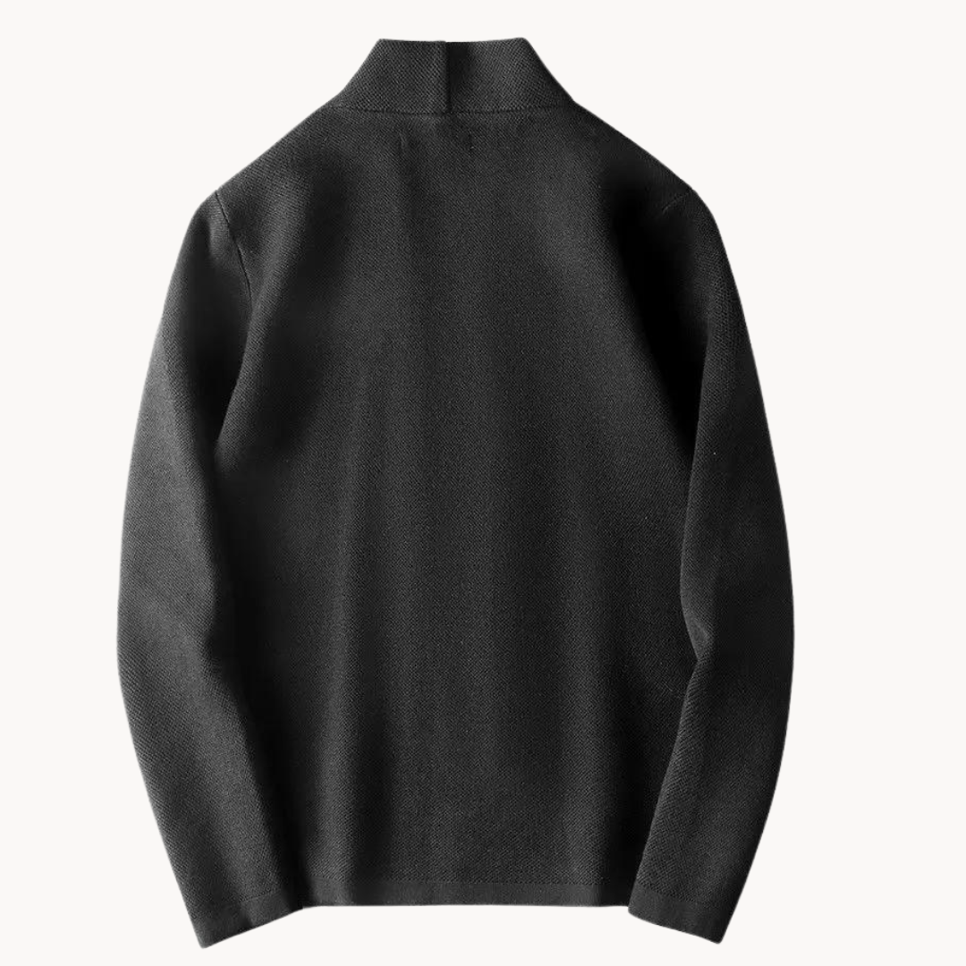 Black textured knit cardigan back view highlighting collar and shoulder stitching