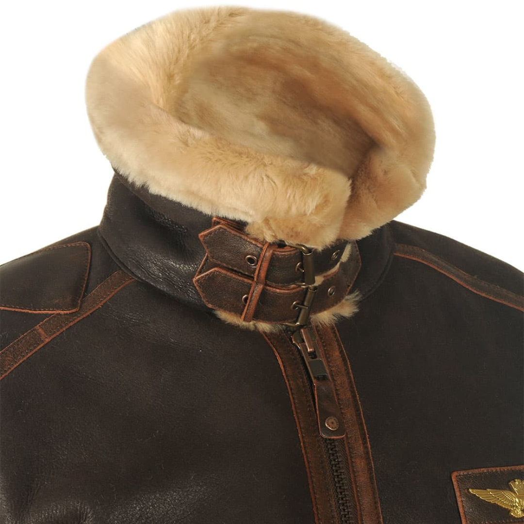 Close-up of shearling collar with adjustable leather strap on brown flight jacket