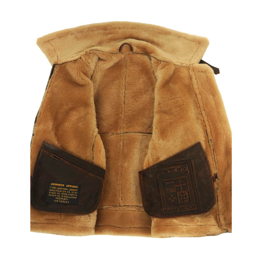 Interior view of pilot jacket showing fur lining and branded leather patches